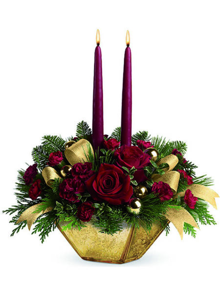 Ciotola natalizia con rose fiori e due candele rosse